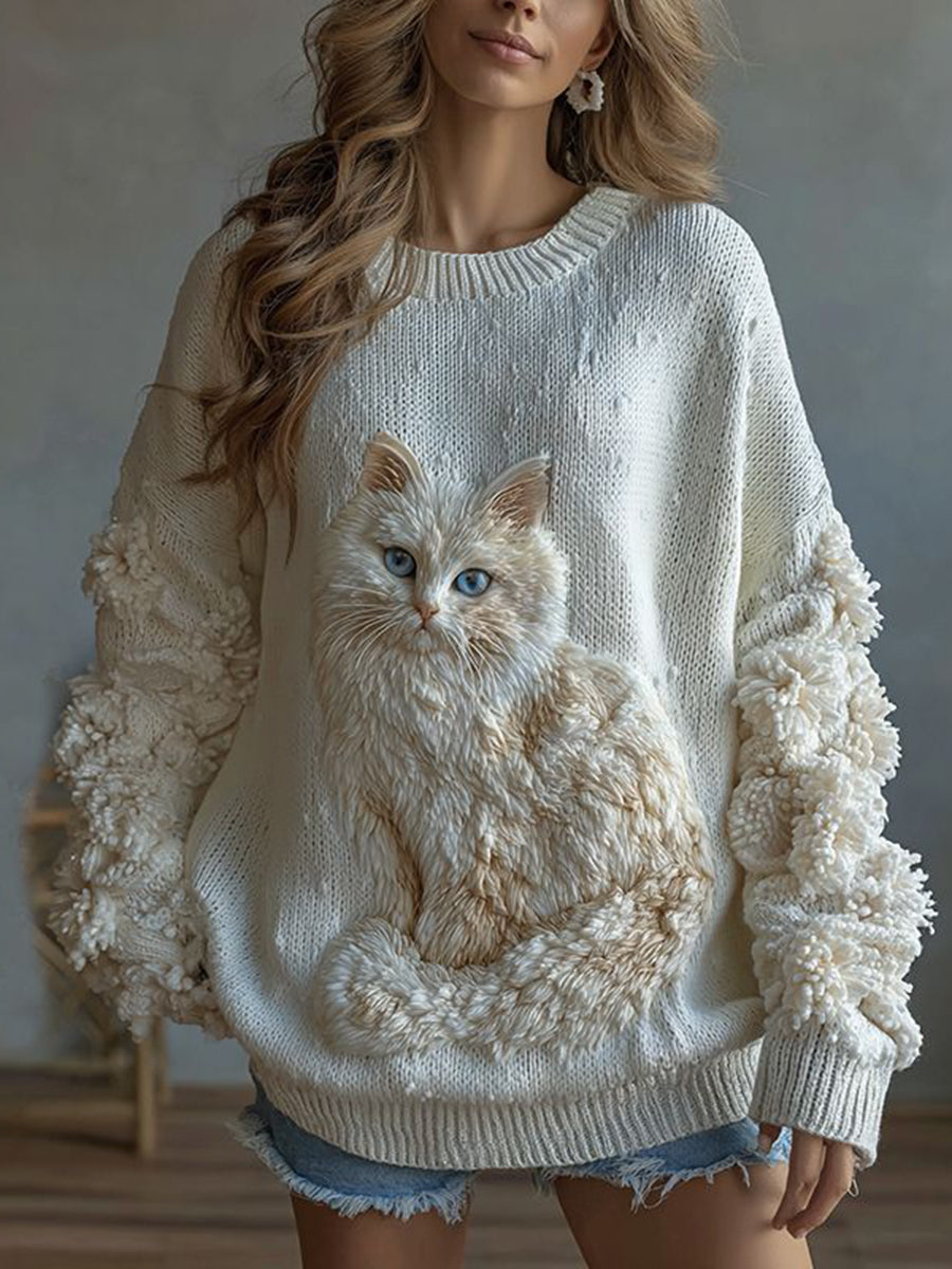 Le chat des femmes a tricoté le chandail