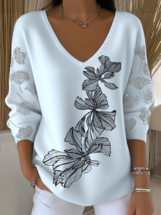 Pull femme bleu clair broderie florale col V