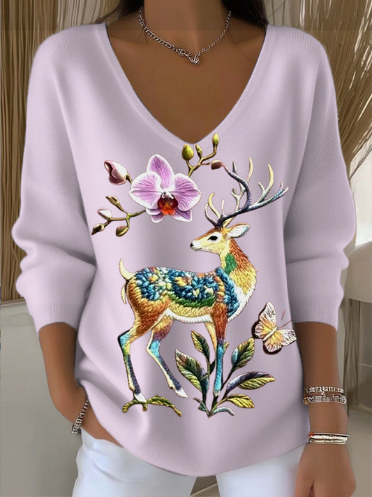 Pull femme col V brodé de cerfs tachetés