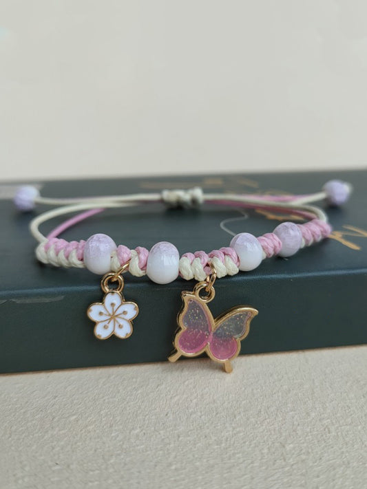 Bracelets de papillon rose de conscience de cancer du sein des femmes