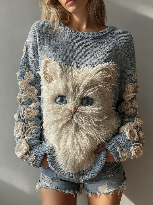 Le chat des femmes a tricoté le chandail