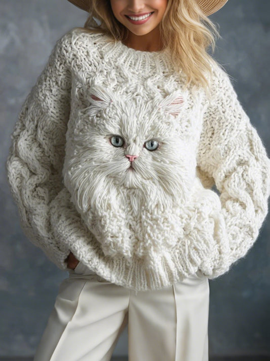 Le chat des femmes a tricoté le chandail
