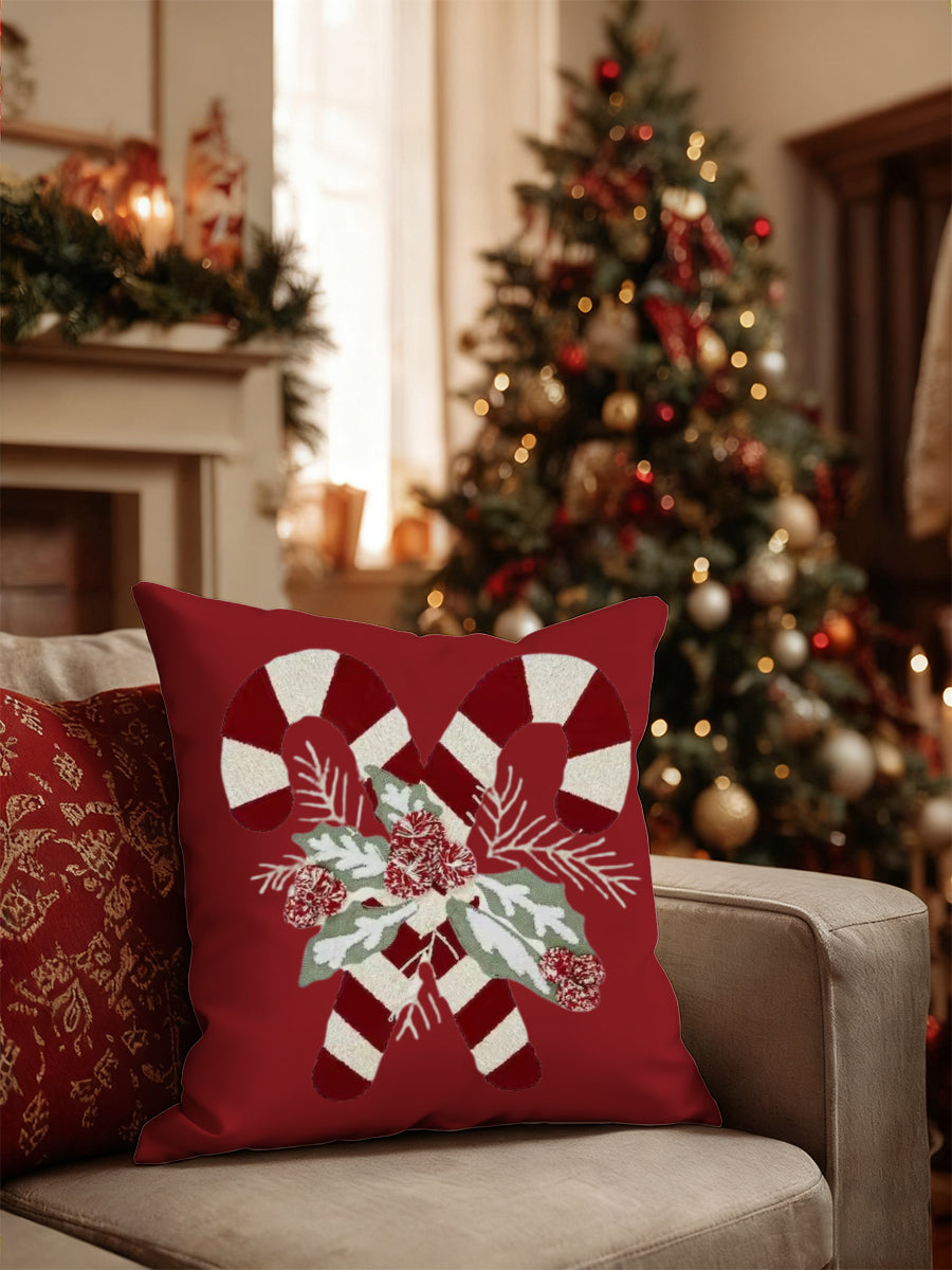 Coussin décoratif à imprimé bonbon et houx de Noël rouge