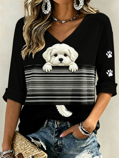T-shirt à manches mi-longues et col en V pour femme, motif color-block avec un petit maltais qui fait coucou et des empreintes de pattes